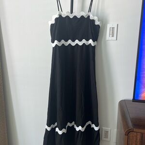 Chic Black Dress with White Wavy Accents